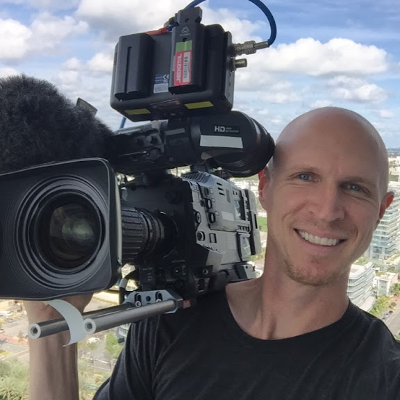 Chris McDaniel with a professional video camera