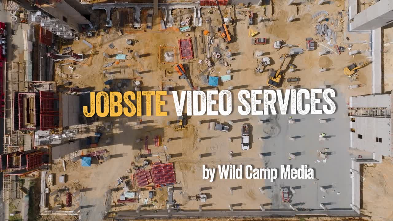 Opening frame of the Wild Camp Media jobsite reel, showing an aerial construction site and the reel title